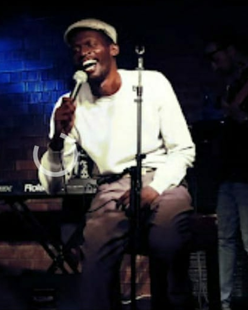 O'Neil Richards performing live on stage